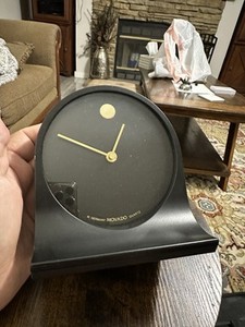 Movado German Clock Size 6”-5.5”  Black Quartz Good Condition Working