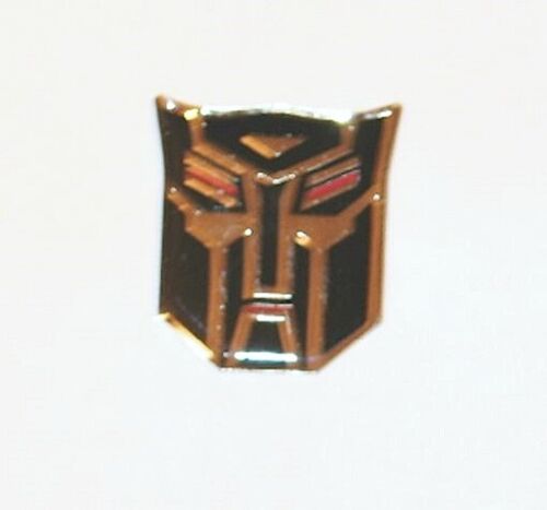 Épingle en métal logo visage noir argent Transformers Autobot NEUF INUTILISÉ - Photo 1/1
