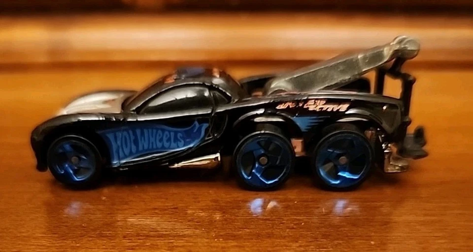 Camión de remolque Hot Wheels Tow Jam de colección negro interactivo azul ruedas 1997 raro Foto 2 de 4