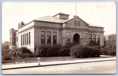 Postcard RPPC MN Sauk Centre Minnesota Library Cannon Display c1941 R74