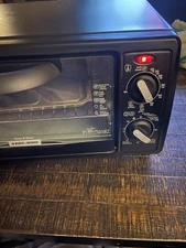 BLACK+DECKER 4-slice Toaster Oven Model: TO1420B Black