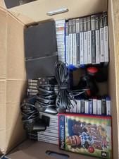 Mega PS2 bundle- Black slim line console with 2 controllers and load of games