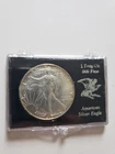 1986 AMERICAN SILVER EAGLE 1 OZ. FINE SILVER BULLION 999 COIN IN CAPSULE /BU-UNC