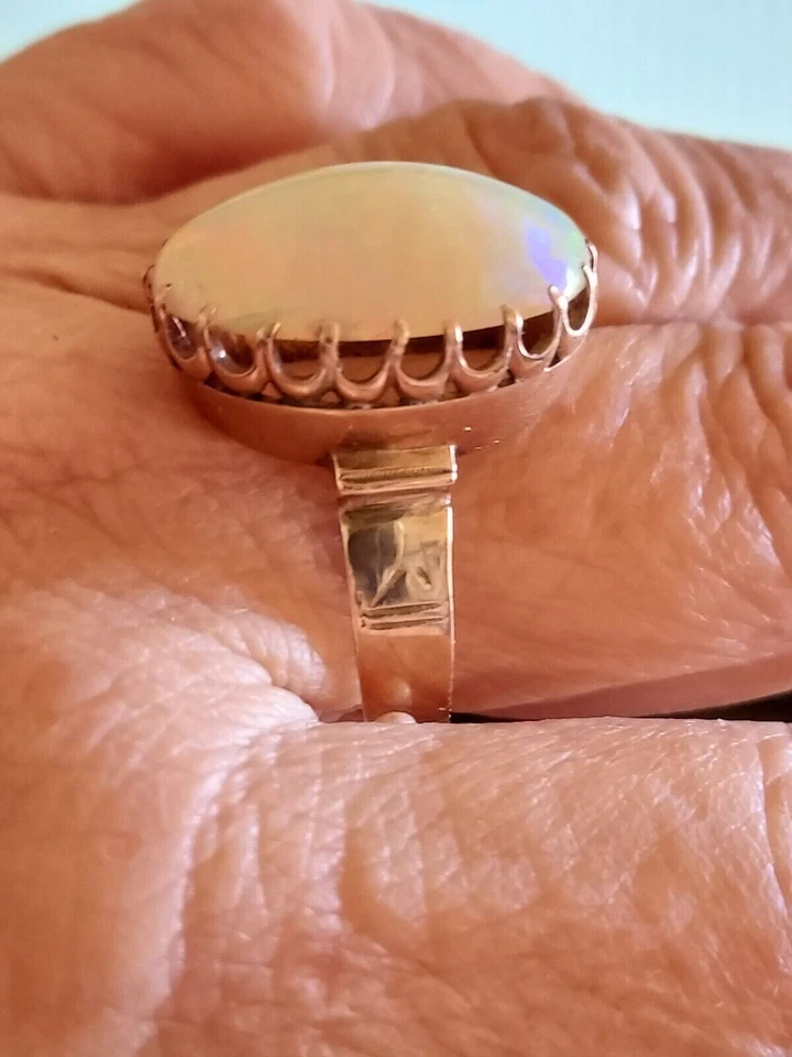 Antiguo anillo de compromiso de ópalo de fuego real de 5 quilates de corte ovalado enchapado en oro amarillo de 14 quilates Foto 2 de 4