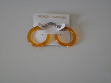 Niedliche Ohrringe für Kinder. Orange mit Strass. 3 cm Durchmesser. Leicht.