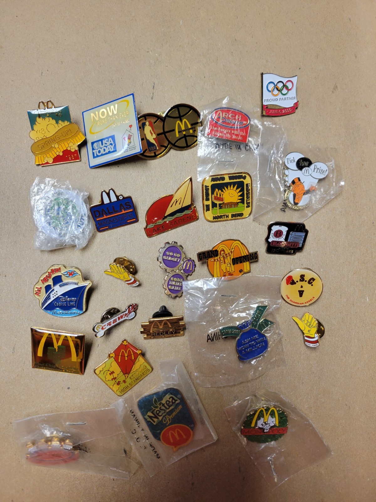 Lot of 25 vintage McDonald's employee lapel pins - some new Lot #4