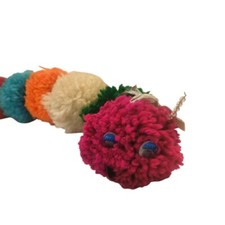 Handmade caterpillar doll made from colorful balls of yarn