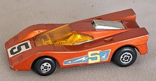 Matchbox Superfast Lesney No. 7 - Hairy Hustler - bronze car, black base version