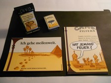 Zippo Camel " Wüster Typ " Hat jemand Feuer,Zippo Camel, 2 Stück 1x Neu 1x Gebr.