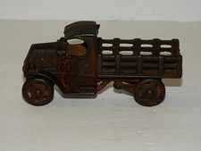 A.C. WILLIAMS CAST IRON STAKE MACK TRUCK 4 3/4" LONG 1930 ERA