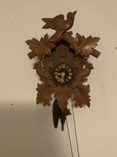 Tolle alte mechanische Kuckucksuhr aus Holz mit Gewichten aus Metall