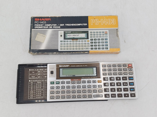 Calculatrice SHARP PC-1403 pocket computer rare vintage made in Japan - Photo 2/24