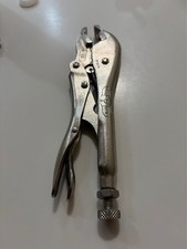 Modified Vise Grip pliers designed to better grip the hex of the fitting body.