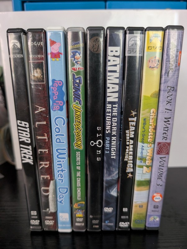 18 DVD Movie Lot: Elmo, Batman, Signs, Exorcist, Team America