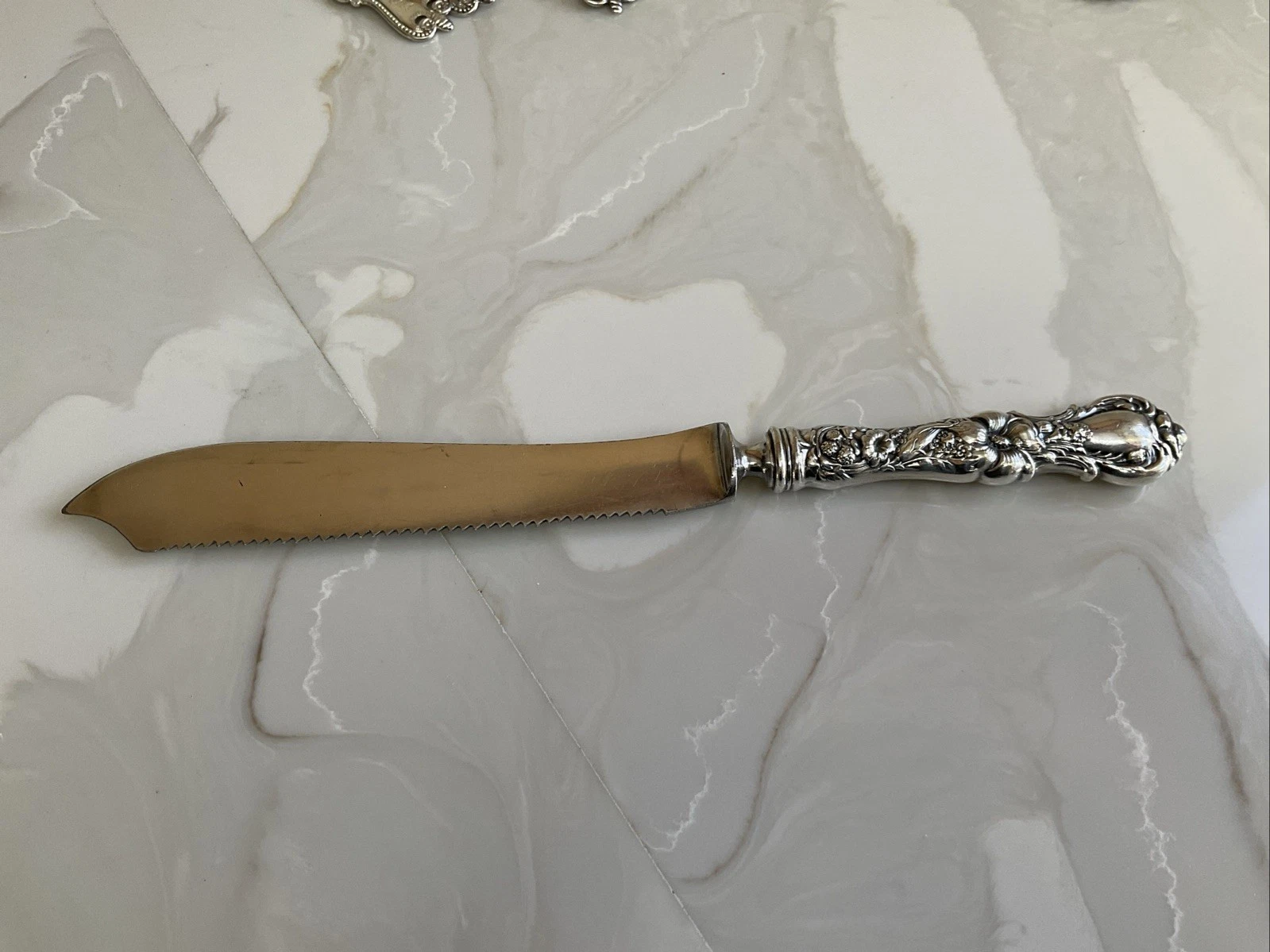 1835 Wallace Serrated Cake Knife 10” Sterling Handle Floral Motif No Monogram