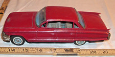 BANDAI 1962 CADILLAC 4DR CAR TIN FRICTION TOY JAPAN IN RED