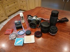 Canon AE-1 Program 35 mm SLR Film Camera With Canon FD 50 mm Lens Extra Lenses