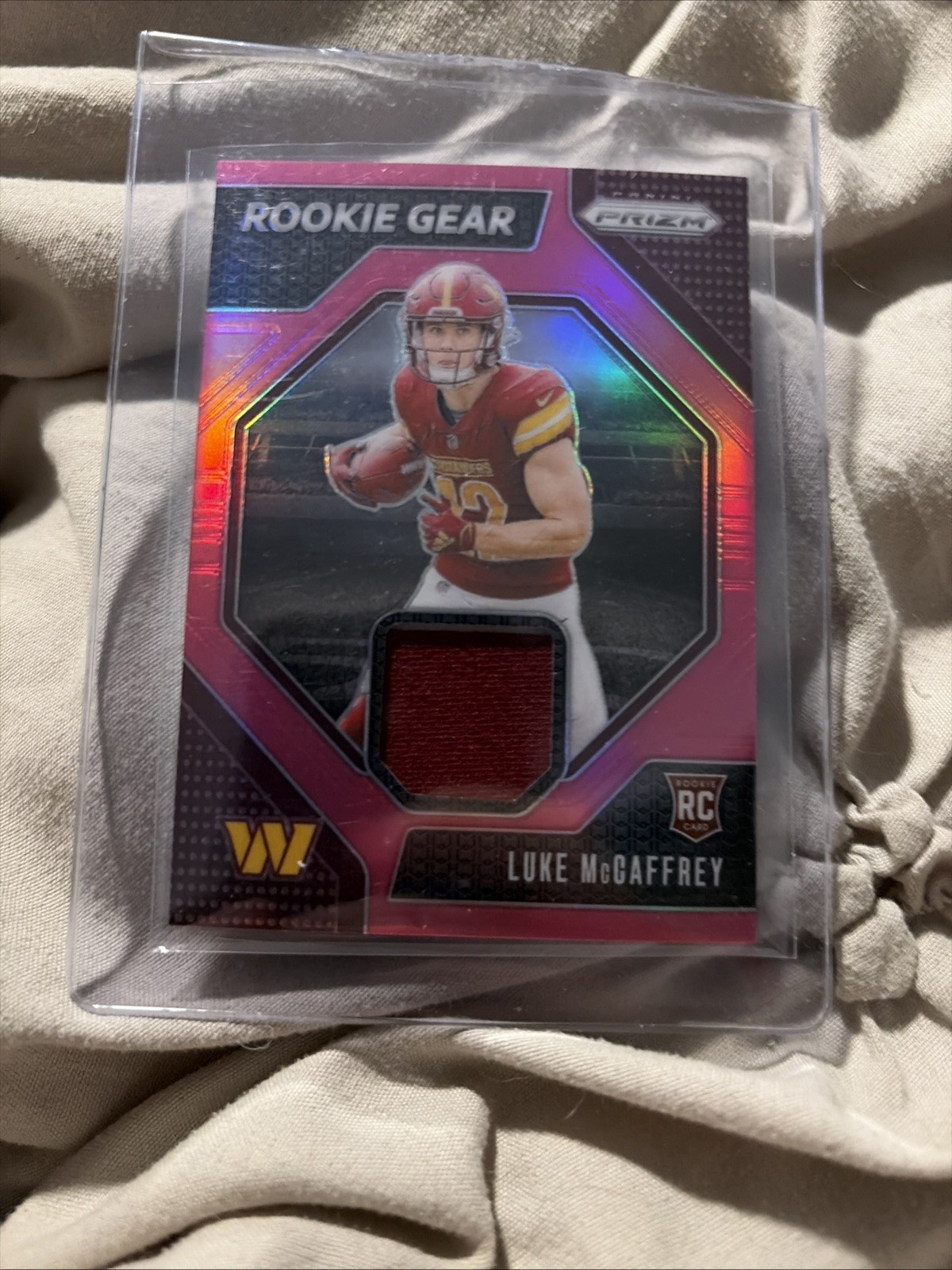 LUKE MCCAFFREY 2024 PRIZM PINK RC PATCH ROOKIE GEAR WASHINGTON #RG-LMY