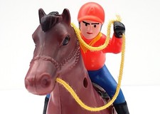 JOCKEY ET SON CHEVAL DE COURSE