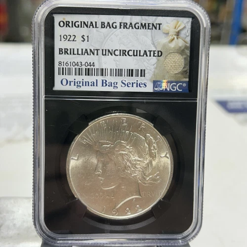 1922 Peace Silver w/ Original Bag Fragment Dollar NGC Brilliant Uncirculated BU