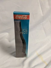Vintage Coca Cola: 7.5" Bottle shaped ice tongs New in Box