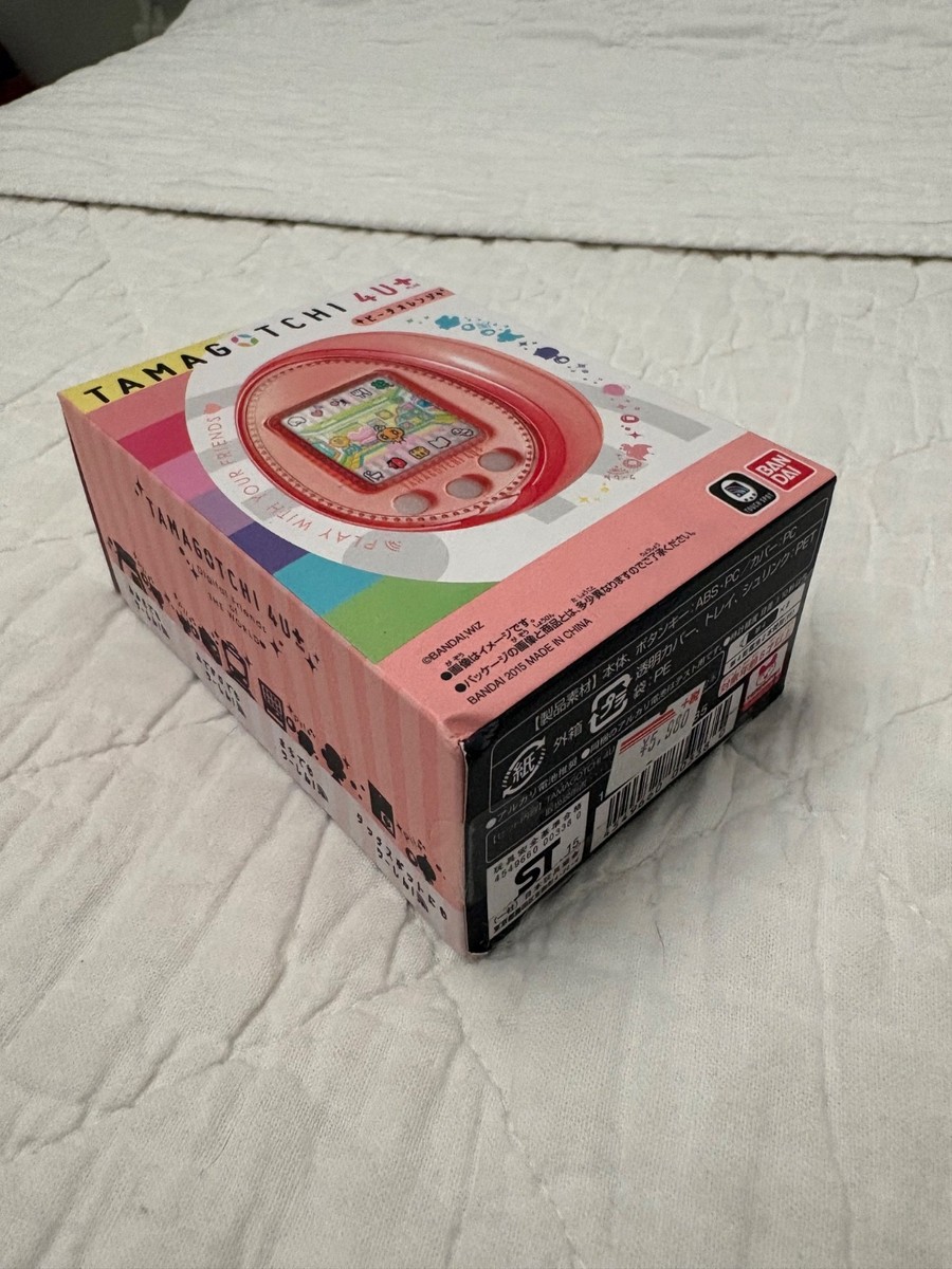 LIGHTLY USED RARE TAMAGOTCHI 4U PLUS IN PEACHY ORANGE in ORIGINAL