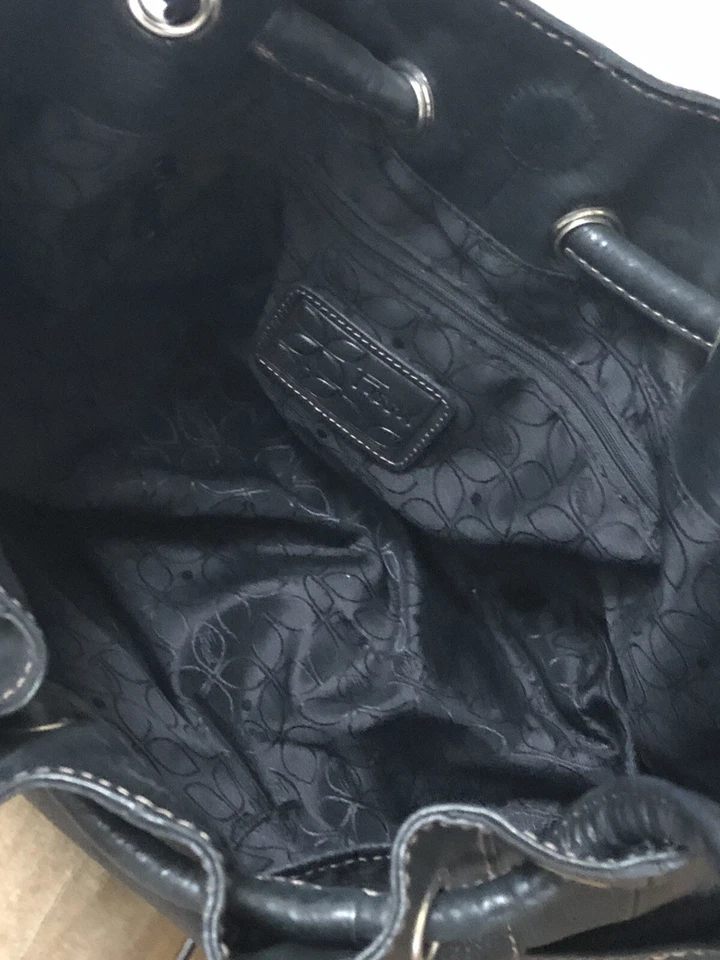 Bolso de Mano FOSSIL Cuero con Cordón Negro Puntadas Bolsillos Laterales Limpio Usado en Excelente Condición Foto 4 de 4