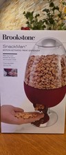 Brookstone Red Snackman Motion Activated Treat Dispenser Candy Nuts Seeds NIB