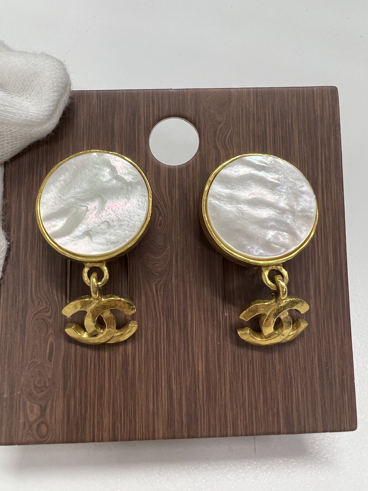 CHANEL Coco Mark Earrings in Gold and White
