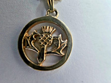 Silver Malcolm Gray thistle pendant on silver chain