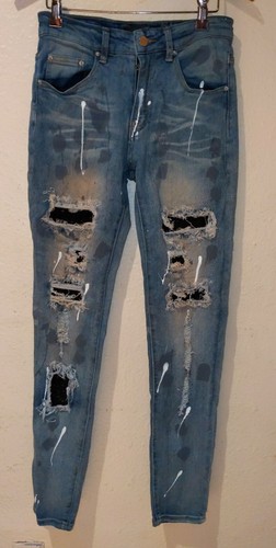 AMIRI Skinny Distressed Denim Jeans 