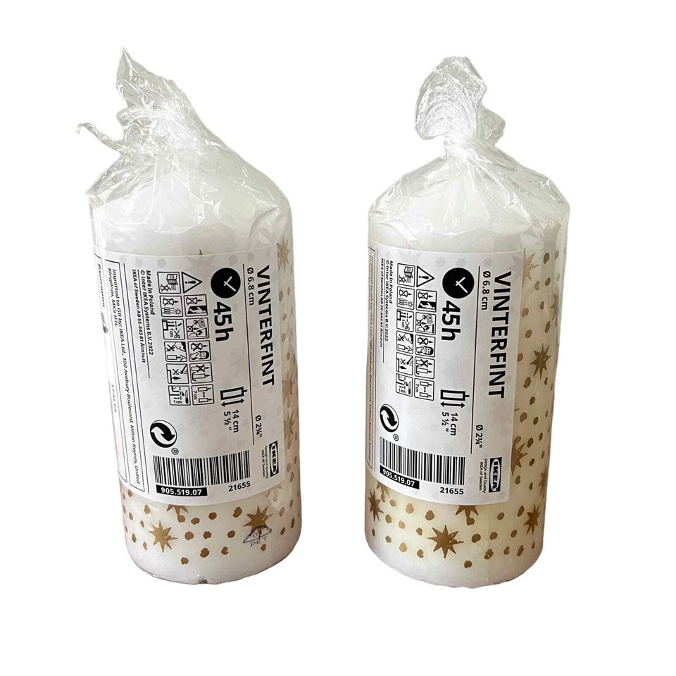 Vela pilar IKEA VINTERFINT blanca y dorada sin perfume de 5 1/2" (juego de 2) Foto 2 de 3