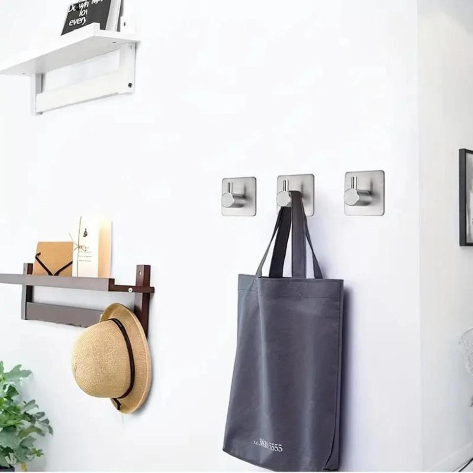 Ganchos de acero impermeables, 4 unidades: autoadhesivos para baño y dormitorio. Foto 4 de 4