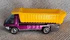 Hot Wheels Redlines Heavyweight Dump Truck Magenta with Dark Interior