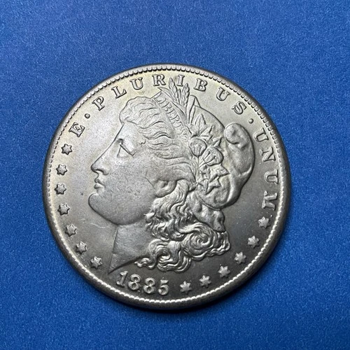 1885 cc Morgan dollar, AU/MS, Lightly Toned
