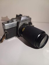 Minolta SRT 200 with zoom lens 35 mm Camera great condition.