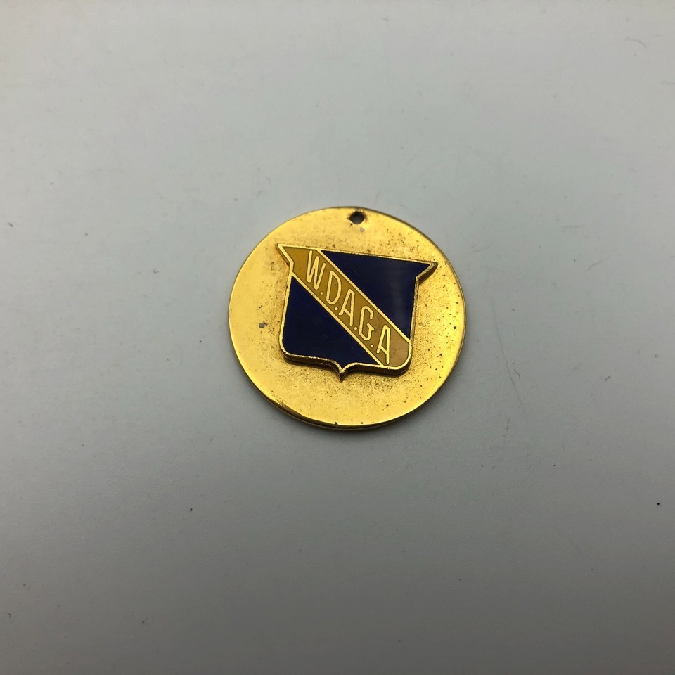 Vtg WDAGA Blue Shield Yellow Stripe On Brass Tone Metal FOB Medal