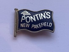 VINTAGE PONTINS NEW PAKEFIELD ENAMEL PIN BADGE 