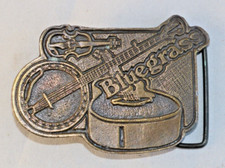 VINTAGE HAND CAST USA BLUEGRASS BELT BUCKLE NUMBERED 192 BANJO FIDDLE GUITAR