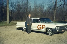 XX113-s Old 35mm Slide Photo- Man by a Car- 1962