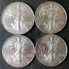 Two 2008 and Two 2009 $1 American Silver Eagle Dollars