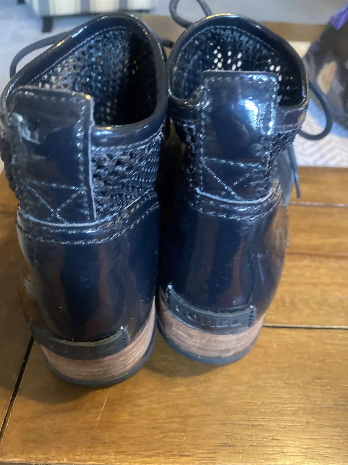 sorel major lace patent mesh ankle booties lace up logo boots