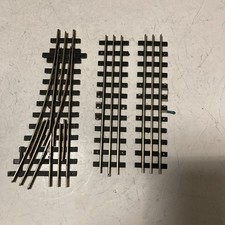 Wrenn oo gauge 3 rail fibre track  . RH point and two 6 inch straights