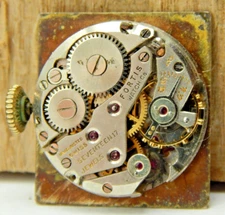 Vintage Fortis 17 jewel Unimex wrist watch movement with dial crown and hands