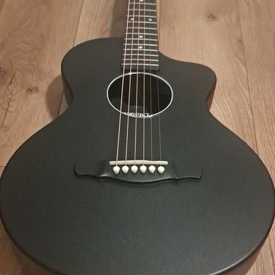 Acoustic Carbon Fiber Guitar.  All Weather Use.  Very Durable And Very Sleek