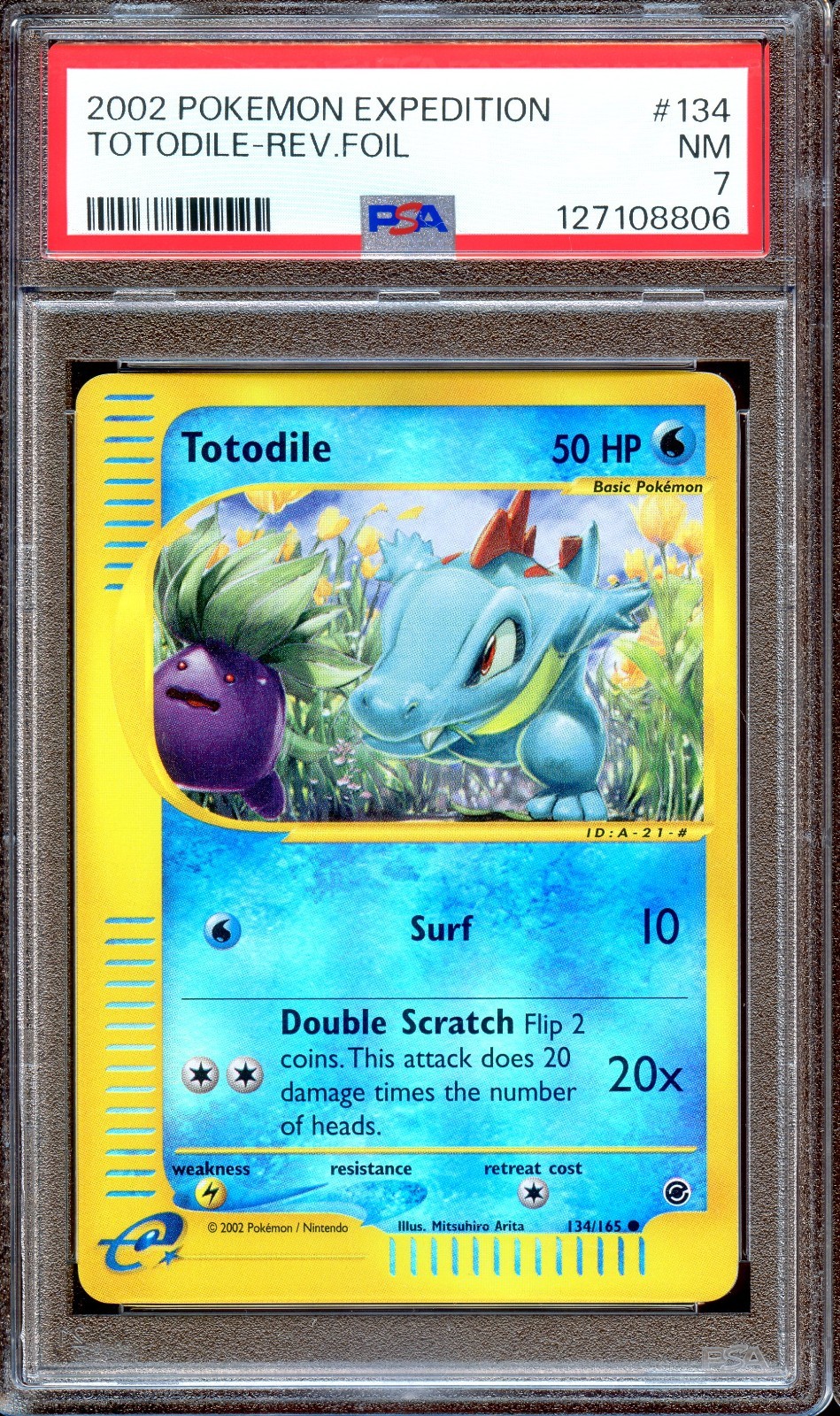 PSA 7 Totodile 134/165 Reverse Foil Expedition E Series 2002 Pokemon Card NM