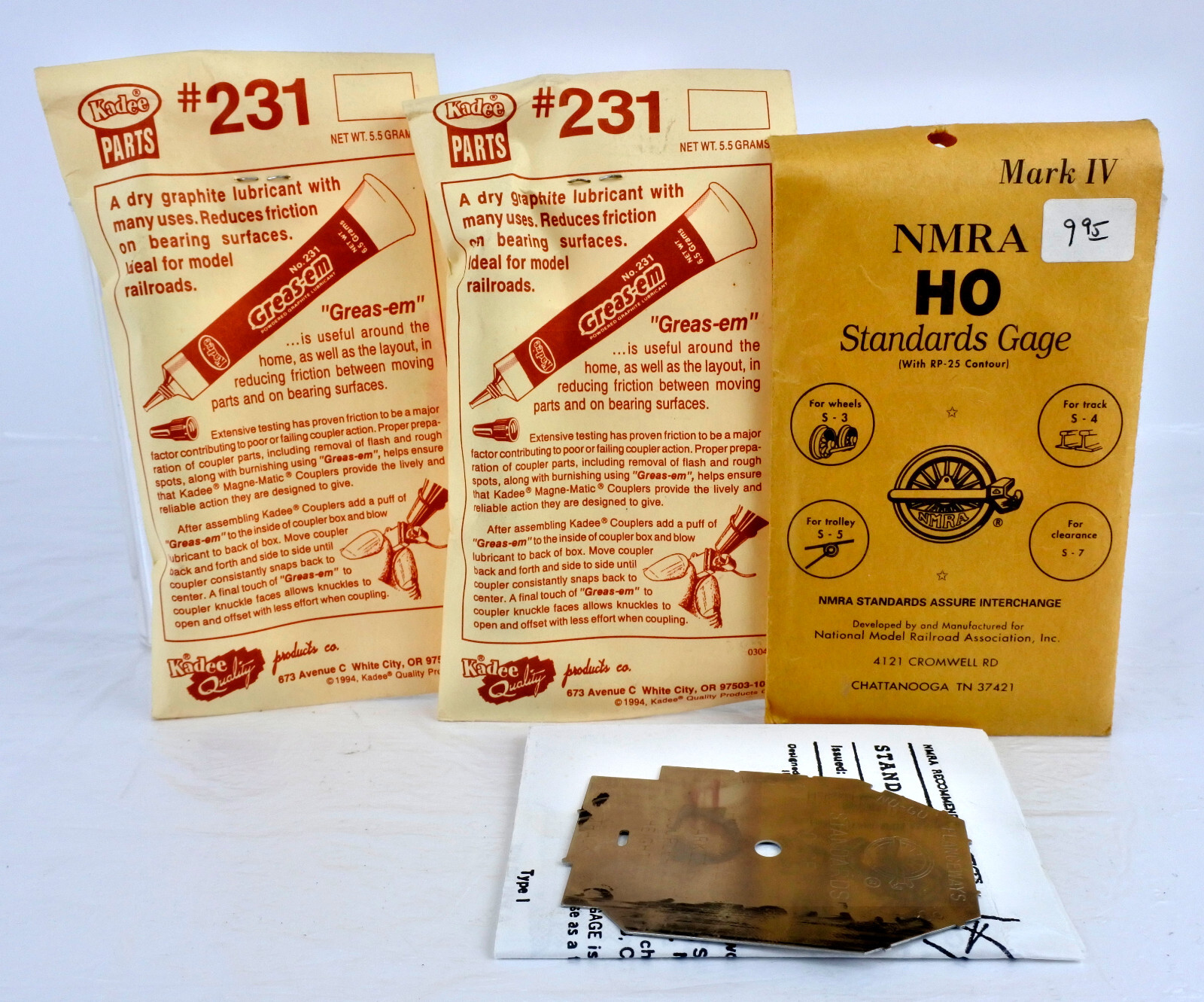 TWO KADEE 231 DRY GRAPHITE LUBRICANT AND ONE NMRA HO MARK IV STD. GAGE