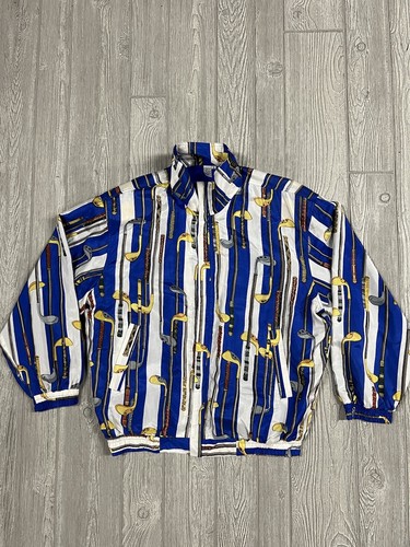 White COACO women's XL full zip golf print, blue/yellow stripes, gold stitching, VTG 80s/90s.