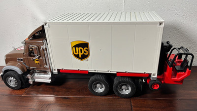 Bruder Mack UPS Logistics Truck with Shipping Container & Forklift Pre-Owned