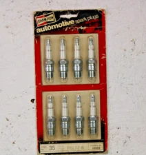 RARE NOS ~1960s era CHAMPION SPARK PLUGS Old Wall Hanger Blister Pack w/ 8 plugs